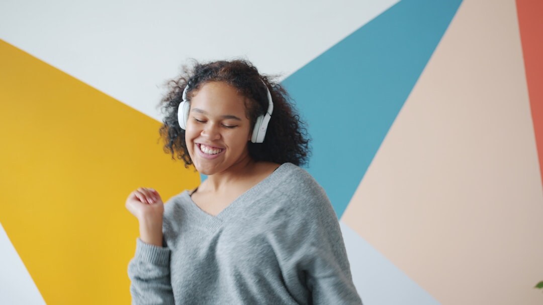 woman listening to music with headphones