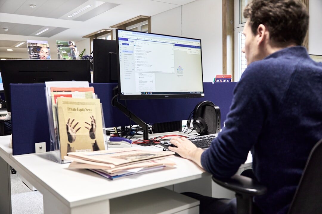Editor reviewing photographs at a desk